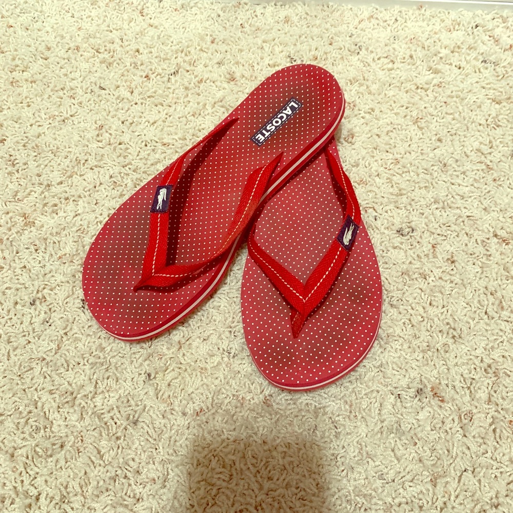 Women’s Lacoste flip flops size 7